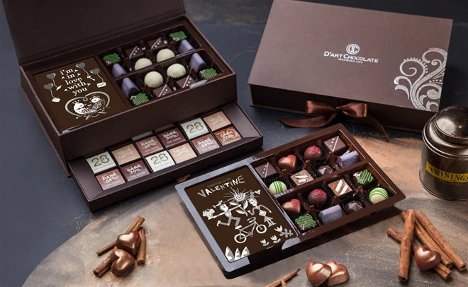 Open boxes of assorted D'art bonbons