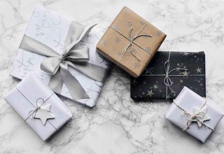 Wrapped and ribboned gift boxes arranged together